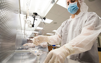 Two Pharmacy techs working in a clean room