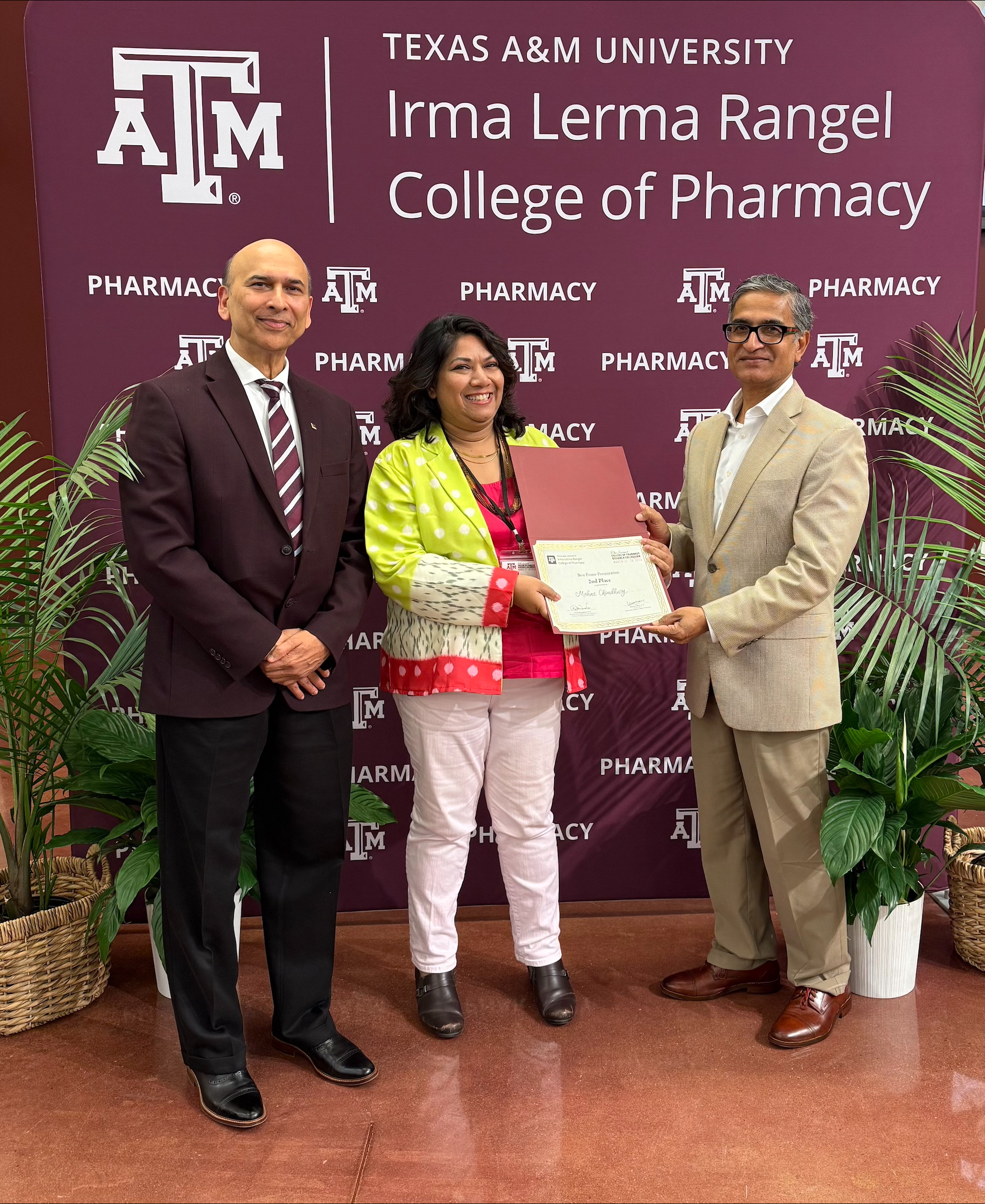 Dr. Choudhury receiving an award
